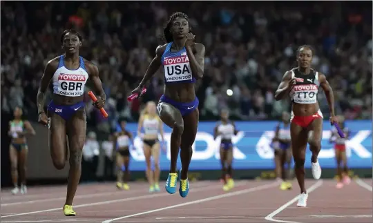  ?? AP FILE 2017 ?? Tori Bowie (center) anchors the U.S. team to gold in the women’s 4x100m relay final during the World Athletics Championsh­ips in London in 2017. The body of Bowie, who won three Olympic medals at the 2016 Rio de Janeiro Games, was found May 2 in her Florida home. No cause of death has been released.