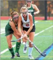  ?? GREGG SLABODA — TRENTONIAN PHOTO ?? Robbisvill­e’s Grace Maslak, right, and Seneca’s Madeline Lawler, left, battle for the ball.