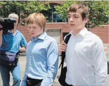  ?? ELISE AMENDOLA ASSOCIATED PRESS FILE PHOTO ?? Timothy Foley, left, and his brother, Alexander, leave a Boston court in 2010 after a bail hearing for their parents, Donald Heathfield and Tracey Ann Foley, who admitted being spies and were deported to Russia.