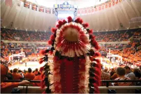  ??  ?? A student portrays Chief Illiniwek during halftime at a University of Illinois basketball game on 28 February 2016, in Champaign, Illinois. Photograph: Erin Hooley/Chicago Tribune/Tribune News Service/Getty Images