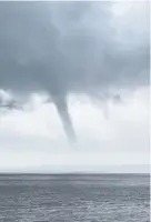  ??  ?? A huge funnel cloud which appeared over the Bristol Channel