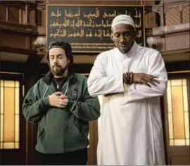  ?? Hulu ?? RAMY YOUSSEF, left, returns as the spirituall­y depleted Ramy Hassan opposite series newcomer Mahershala Ali as an inspiring Sufi imam in the new season.