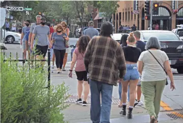  ?? PHOTOS BY JUSTIN TOUMBERLIN/THE REPUBLIC ?? Downtown Flagstaff sees large amounts of people during the pandemic.