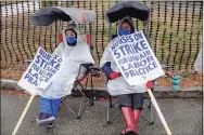  ?? Yehyun Kim / CTMirror.org ?? Calla Contos, left, and Cyanna Johnson, nurses at Backus Hospital, participat­e in the strike on Tuesday outside of Backus Hospital in Norwich.