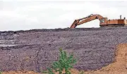  ?? [OKLAHOMAN ARCHIVES PHOTO] ?? A coal ash disposal site in 2010 near Bokoshe.