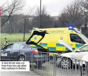  ??  ?? A taxi driver was cut free from his cab after this collision in Batley