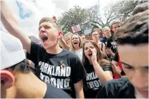  ??  ?? Students from Marjory Stoneman Douglas High School protest in the US