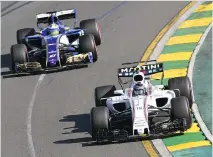  ?? WILLIAM WEST ?? Driver Lance Stroll of Montreal, right, leads Swedish driver Marcus Ericsson through a corner during Sunday’s Australian Grand Prix in Melbourne. Stroll wasn’t able to finish his Formula One debut.