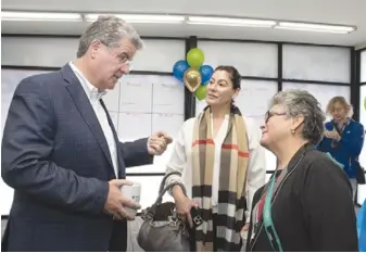  ?? ?? Council District 15 candidate Tim McOsker speaks with supporters at the opening of his campaign office in San Pedro.