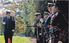  ?? JOE BARKOVICH SPECIAL TO THE WELLAND TRIBUNE ?? Buglers from the former Belleropho­n Bugle Band, from left Dan Williams, Mim Rodrigue, Albert Crumb and Bob Clarkson ready to perform theLast Post. At right is pipe major Tim Woodhead.