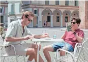  ??  ?? Elio (Chalamet) initially mistakes Oliver’s (Armie Hammer) gruff flirtation­s for arrogance, but becomes enraptured after weeks exploring their Italian village in “Call Me By Your Name.” SAYOMBHU MUKDEEPROM/SONY PICTURES CLASSICS