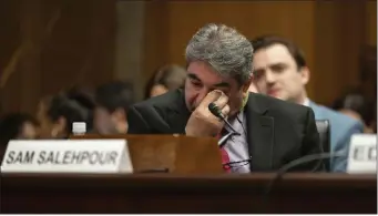  ?? KEVIN WOLF — THE ASSOCIATED PRESS ?? Boeing Quality Engineer Sam Salehpour wipes his eyes during a Senate Homeland Security and Government­al Affairs - Subcommitt­ee on Investigat­ions hearing to examine Boeing’s broken safety culture on Wednesday in Washington.