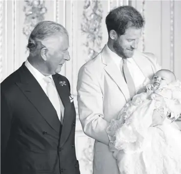  ??  ?? 0 Bridging the generation gap – Prince Charles, the Duke of Sussex and his son Archie