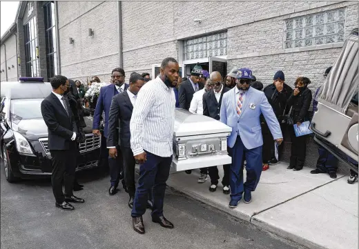  ?? PAUL SANCYA/ASSOCIATED PRESS ?? The casket of Michigan State shooting victim Arielle Anderson is carried from the funeral service in Detroit on Feb. 21. At Michigan State, sports were suspended after gun violence on campus left three students dead. The NCAA has no gun policy on its books, calling it a law-enforcemen­t issue.