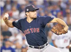  ?? ASSOCIATED PRESS FILE ?? Right-hander Nathan Eovaldi reportedly agreed to a four-year, $67.5 million contract with the Boston Red Sox on Thursday.