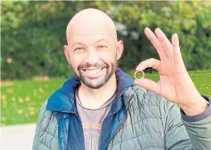  ?? CHRIS TURNER PHOTO ?? Actor Jon Cryer, best known for his role in “Two and a Half Men,” holds the wedding ring he lost Friday while walking along Vancouver’s seawall. A local ring sleuth was able to track it down.