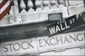  ??  ?? U.S. stocks were barely lower early Wednesday as banks and technology companies gave back some of their gains from earlier in the week.