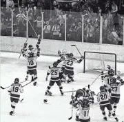  ?? ASSOCIATED PRESS ?? U.S. hockey team members celebrate their win Feb. 22, 1980, against the Soviet Union at the Lake Placid Olympics.