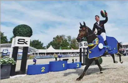  ??  ?? Enniscrone’s Richard Howley on board Uppercourt Cappucino celebrate becoming 5-year-old World Champions after a 24-horse jump off at the World Championsh­ips for Young Horses at Lanaken in Belgium on Sunday.