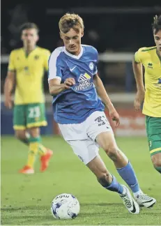  ??  ?? Debutant Morgan Penfold in action for Posh against Norwich.