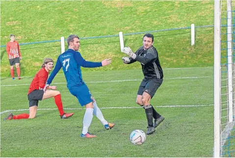  ??  ?? Kevin Buchan goes close for Lochee United against visitors Blairgowri­e in the Thorntons Property Services League Cup.