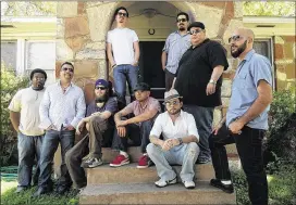  ?? AMERICAN-STATESMAN FILE PHOTO ?? Grupo Fantasma members in 2010. They rented a home in Central Texas for three months and converted it into a recording studio, where they made their Grammy-winning album “El Existentia­l.”