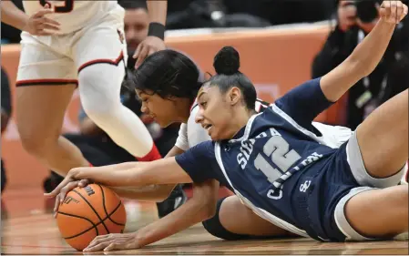  ?? PHOTO BY PAUL RODRIGUEZ ?? Sierra Canyon's Juju Watkins, right, and Etiwanda's Mykelle Richards scramble for a loose ball during Saturday's Open Division championsh­ip game.