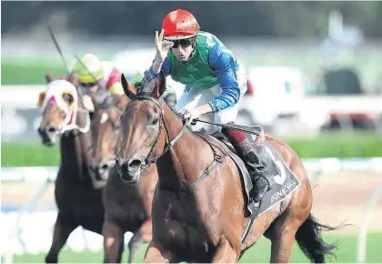  ?? Picture / Bradley Photograph­y ?? Hugh Bowman celebrates on Bonneval in the Australian Oaks in April.