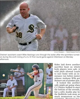  ?? KYLE FRANKO — TRENTONIAN PHOTO ?? Steinert assistant coach Mike Hastings runs through the water after the sprinklers turned on during the sixth inning of a CJ III first round game against Allentown on Monday afternoon.