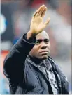  ??  ?? Man of faith: Fabrice Muamba waves to the crowd at Reebok Stadium in Bolton.