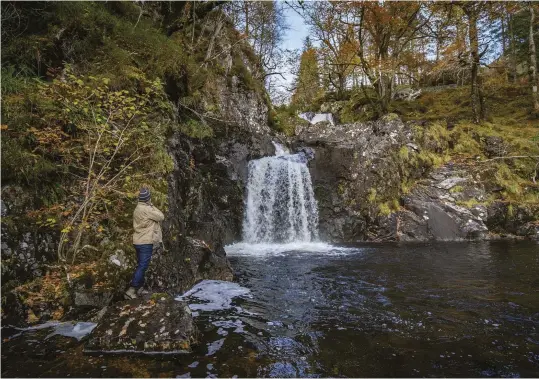  ??  ?? ABOVE Author Mark Sutcliffe admires the Chia-Aig waterfall as it plunges into the eastern end of Lock Arkaig