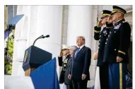  ?? NEW YORK TIMES AL DRAGO / THE ?? President Donald Trump stands with Secretary of Defense James Mattis and other military leaders during a Memorial Day ceremony. Trump announced a ban on transgende­r servicemem­bers Wednesday.