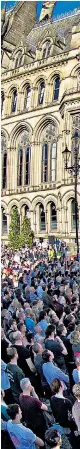  ??  ?? Right: thousands of people attended a vigil in Albert Square outside Manchester Town Hall yesterday evening