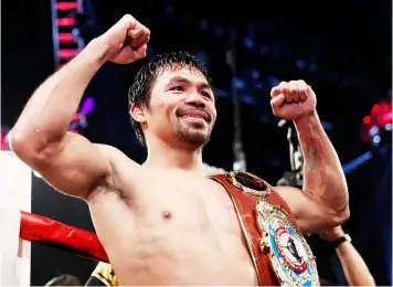  ?? (AP Photo/Isaac Brekken, File) ?? In this Nov. 5, 2016 file photo, Manny Pacquiao, of the Philippine­s, celebrates after defeating Jessie Vargas in their WBO welterweig­ht title boxing match, in Las Vegas. Pacquiao will fight Australian Jeff Horn on July 2 at Brisbane’s 52,500-capacity...