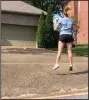  ?? (Arkansas Democrat-Gazette/Celia Storey) ?? Meredith Pinkston does the Driveway Challenge in three parts by rolling a ball toward the garage and then doing as many pushups or jump squats or jump lunges as she can before the ball returns to her.