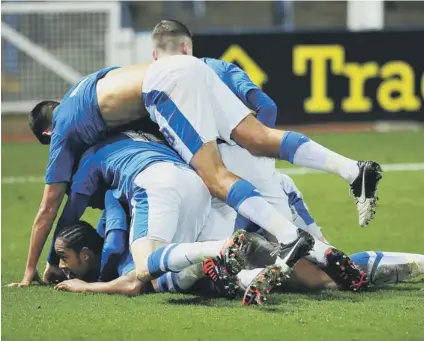  ??  ?? Posh Youths heap praise on Jaanai Gordon after his goal against Aston Villa.