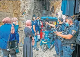  ?? /AFP (More reports inside) ?? Covid-19 crackdown: Israeli police enforce coronaviru­s regulation­s in Jerusalem’s Old City on Thursday as protests against its plan to annex parts of the Israeli-occupied West Bank continue countrywid­e.