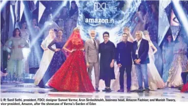  ??  ?? L-R: Sunil Sethi, president, FDCI; designer Suneet Varma; Arun Sirdeshmuk­h, business head, Amazon Fashion; and Manish Tiwary, vice-president, Amazon, after the showcase of Varma’s Garden of Eden