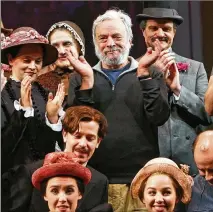  ?? SARA KRULWICH/THE NEW YORK TIMES ?? Stephen Sondheim (center left) leads crew and cast in a round of applause at a final dress rehearsal for “Sunday in the Park with George" at New York’s Studio 54 in 2008.