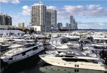  ?? D.A. VARELA dvarela@miamiheral­d.com | Feb. 14, 2023 ?? One of the venues for the Miami Internatio­nal Boat Show, which runs today through Sunday, is at One Herald Plaza in Miami. The show will have hundreds of exhibitors showing the latest boats, water toys and safety technology.