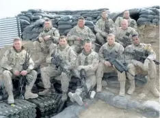  ?? THE CANADIAN PRESS/HANDOUT ?? Lionel Desmond (front row, far right) was part of the 2nd battalion, of the Royal Canadian Regiment, based at CFB Gagetown and shown in this 2007 photo taken in Panjwai district in between patrol base Wilson and Masum Ghar in Afghanista­n.