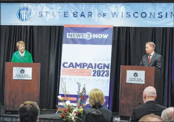  ?? Morry Gash
The Associated Press file ?? Wisconsin Supreme Court candidates Republican-backed Dan Kelly and Democratic-supported Janet Protasiewi­cz debate on March 21 in Madison, Wis.