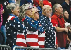 ?? Associated Press photo ?? People recite the Pledge of Allegiance during a rally for President Donald Trump Sunday in Chattanoog­a, Tenn.