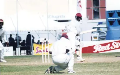  ?? FILE ?? In this picture taken on February 8 1996, Laurie Williams, who took six wickets in the match, suffers a first-ball duck with the bat. Stuart Williams does the honours at slip.