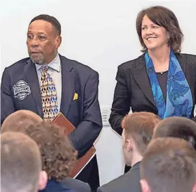  ?? TOLEDO CHAPTER OF THE NATIONAL FOOTBALL FOUNDATION ?? Former Toledo quarterbac­k Chuck Ealey was honored last spring at a National Football Foundation event in Toledo, appearing alongside USA TODAY Sports columnist Christine Brennan.