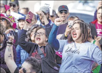  ??  ?? Participan­ts in the Empowering Women March 2020 chant feminist and progressiv­e political phrases Saturday outside the Lloyd George U.S. Courthouse.