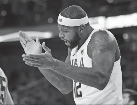  ?? L.E. BASKOW/AP PHOTO ?? DeMarcus Cousins celebrates a basket against Argentina during the U.S. Olympic team’s basketball 111-74 victory over Friday in Las Vegas.