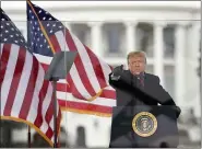  ?? EVAN VUCCI — THE ASSOCIATED PRESS ?? President Donald Trump speaks during a rally protesting the electoral college certificat­ion of Joe Biden as president on Wednesday in Washington.