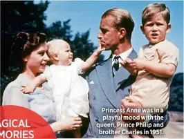  ??  ?? Princess Anne was in a playful mood with the queen, Prince Philip and brother Charles in 1951.