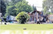  ?? ALESSANDRA DA PRA/ASSOCIATED PRESS ?? Debris is strewn about from a partially collapsed home in Land O' Lakes on Friday.